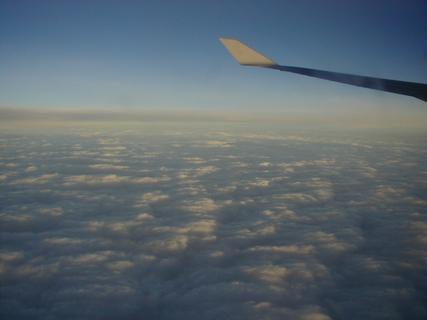 Clouds from the plane.  You really get the *best* views of clouds from planes - I took lots of cloud photos!<br>Location: Over Pacific Ocean